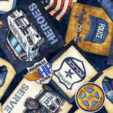 Load image into Gallery viewer, QT Fabrics - American Heroes Police - Overlapping Patches - 1/2 YARD CUT
